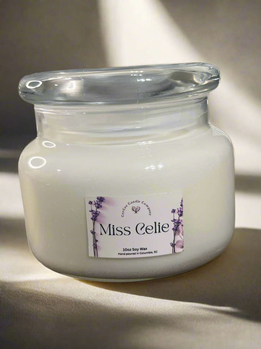 The Double Wicked Apothecary Soy Candle by CeeCee Candle Company is a large glass jar candle with white soy wax, hand-poured and double wicked, featuring lavender sprigs on the label and displayed on a neutral surface in soft lighting.