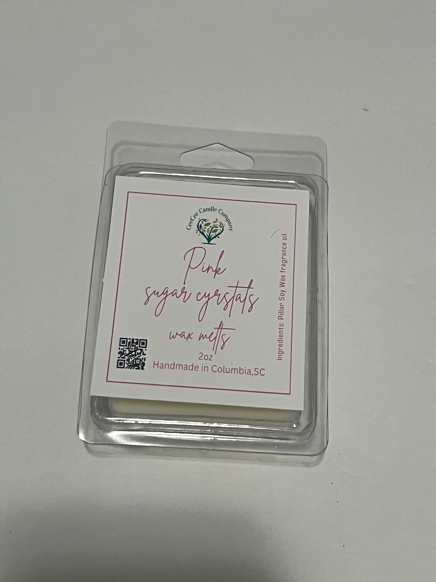 A 2oz clamshell of "Pink Sugar Crystals" soy wax melts from CeeCee Candle Company, handmade in Columbia, SC with a QR code on the lower left—ideal for your Build Your Own Wax Melts Bundle.