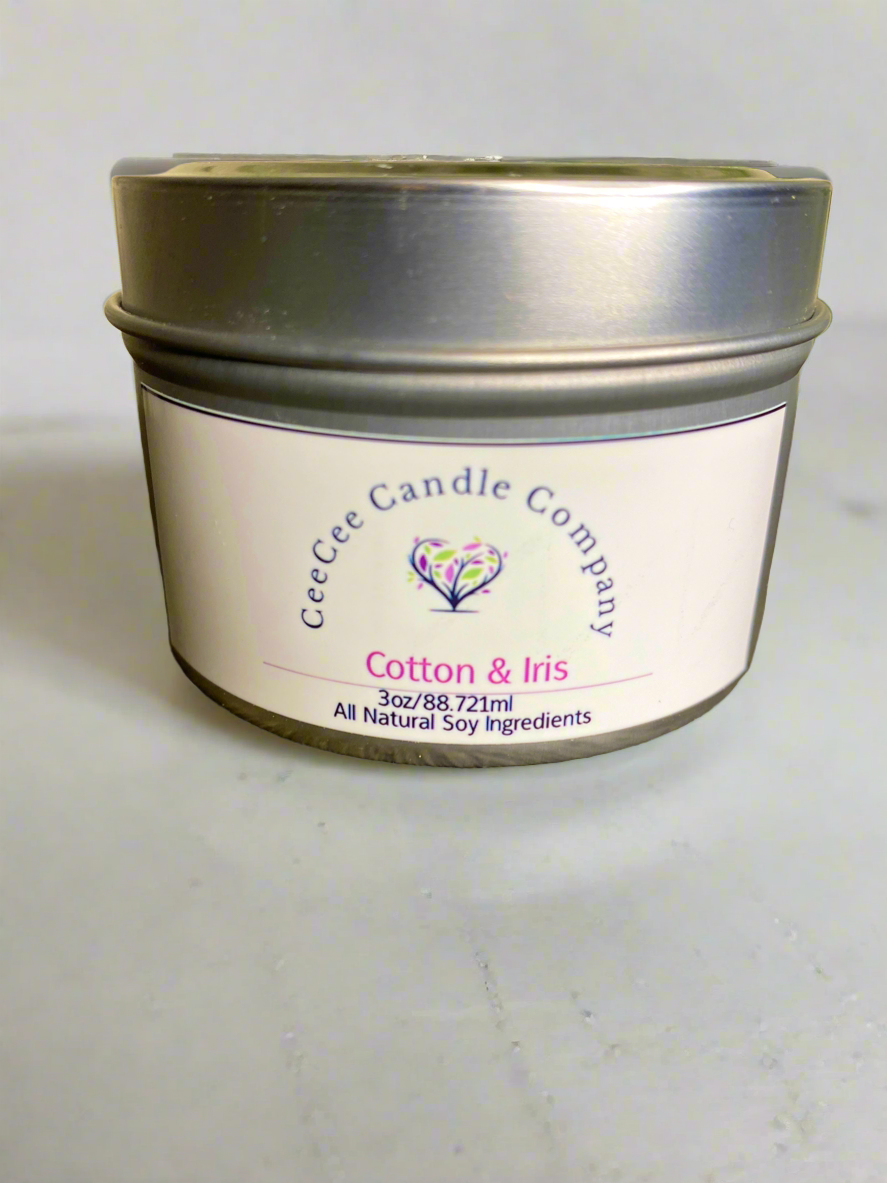The CeeCee Candle Company Travel Size Soy Candle (3oz/88.7ml) features a floral logo on a silver tin and is made with all-natural soy wax—perfect for mood-boosting fragrance wherever you go.