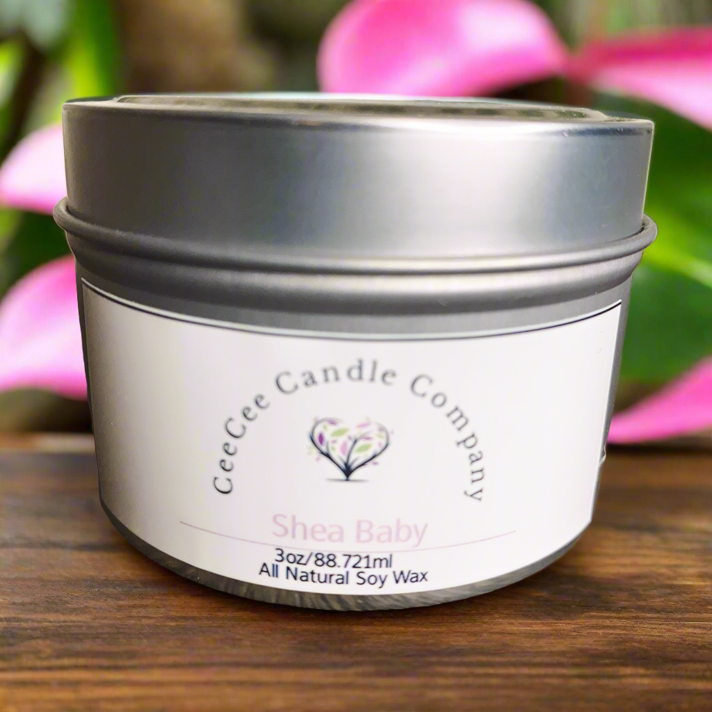 A 3oz Travel Size Soy Candle from CeeCee Candle Company, made with all-natural soy wax and a mood-boosting scent, displayed with a heart-shaped floral logo against green leaves and pink petals.